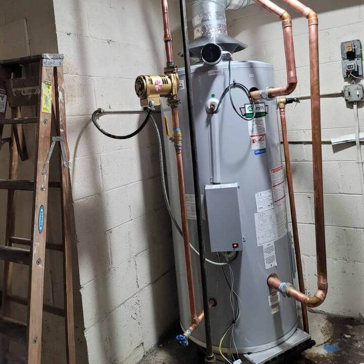 Installation of a high-efficiency condensing water heater in Chicago, Illinois.